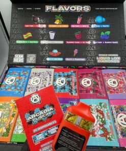 Open Arcadia Fusion display with dual-flavor devices, colorful retail boxes, and ten flavor pairings
