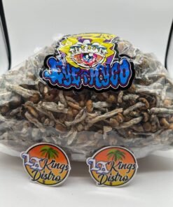Large bag of dried mushrooms labeled School Teacher shrooms with pale stems, brown caps, and blue-gray bruising