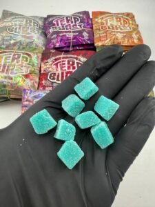 Authentic Terp Burst 800mg Liquid Diamond Gummies
Authentic Terp Burst 800mg Liquid Diamond Gummies bring a flavor-led edible format to adults who prefer clearly divided portions. The photographed pouch states 800mg total across eight gummies, with 100mg listed for each piece. It also identifies live resin cannabis oil among the ingredients. Always confirm the printed batch information, testing details, and local rules before purchase or consumption.
Terp Burst 800mg Flavor Lineup
The available selection shown includes Cranberry, Peach Pop, Cherry Pie, Coconut Lime, Grape Soda, Moneydew Mist, Lemonz, and Grape Cool Aid. Cranberry offers a tart berry profile, while Peach Pop leans juicy and candy-like. Cherry Pie combines ripe cherry sweetness with a dessert finish. Coconut Lime balances creamy tropical notes with bright citrus. Grape Soda tastes sweet and fizzy-inspired. Moneydew Mist delivers mellow melon character. Lemonz brings sharp citrus, and Grape Cool Aid provides a nostalgic purple-drink style.
Why Choose Terp Burst Liquid Diamond Gummies?
Customers can compare eight distinct flavors while receiving eight individually portioned pieces per pouch. The resealable packaging is compact and easy to store. However, 100mg per piece represents a very strong labeled serving for many consumers. Product appearance, flavor, and packaging should never replace verified laboratory information or responsible dosing decisions.
Terp Burst 800mg Usage Details
Read the entire label before opening. New or low-tolerance consumers should not treat one full gummy as a starter portion. Follow applicable guidance from a licensed retailer or healthcare professional, begin cautiously, and wait several hours before considering more because edible onset can be delayed. Never mix THC edibles with alcohol, drive, operate machinery, or perform safety-sensitive work after use. Keep the pouch sealed and locked away from children and pets.
Authentic Terp Burst Gummies FAQ
How many gummies are included?
The displayed pouch states eight pieces.
How much is listed per gummy?
The package shows 100mg per piece and 800mg total.
Are all flavors identical in strength?
Do not assume so; verify each pouch and batch label.
How should they be stored?
Keep them sealed, cool, dry, and protected from heat and direct sunlight for best freshness.
Product Accuracy and Safety Note
Current listings also describe this edition as eight gummies containing a labeled 100mg each for 800mg total, matching the photographed packaging.
Edibles can take 30 minutes to two hours to produce noticeable effects and may last longer than expected, making early redosing risky.
California’s 2026 licensed-market rules generally limit edible cannabis products to 10mg THC per serving and 100mg THC per package. Therefore, an 800mg package displaying a California symbol should not be assumed compliant or authentic without verifiable licensing, batch testing, and regulated-retailer information