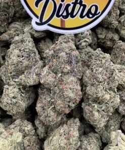 Strawberry Guavaz THC weed showing dense frosty cannabis buds with green and purple colours