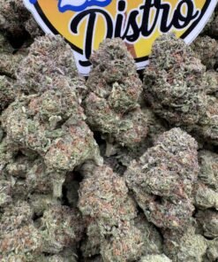 Frosty purple and green Project 4516 cannabis flower buds beside the LA Kings Distro logo