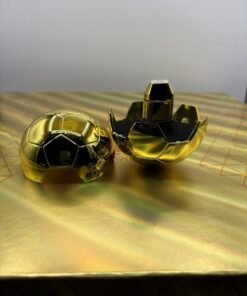 Open gold soccer-ball case holding an Authentic Ace 2G Disposable World Cup Edition device and collectible ring
