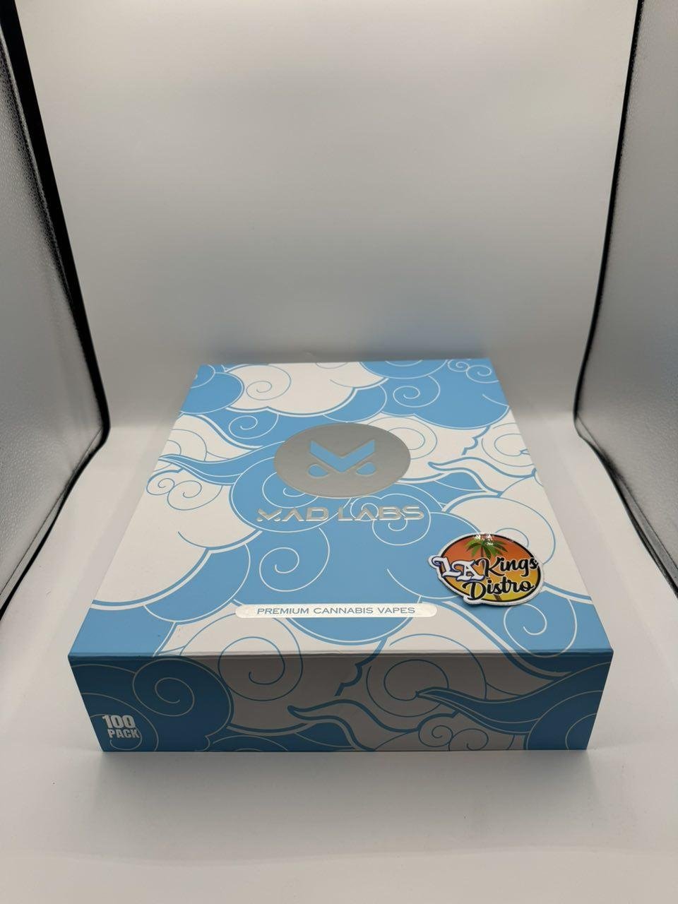 blue-and-white Authentic Mad Labs 2G Disposable 100-pack master case pattern packaging