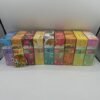 Authentic Next 2G disposable rechargeable vape boxes showing nine Indica, Sativa and Hybrid flavor varieties