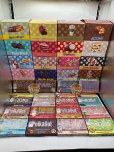 Authentic PolkaDot 4G mushroom Belgian chocolate bars displayed in assorted dessert candy cereal and cookie-inspired flavors
