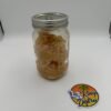 Clean Cat 3 raw sugar cannabis concentrate with golden crystalline texture in glass jar