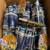 Authentic Cake Pre Rolls in holographic individual tubes with premium rolled pre-roll displayed