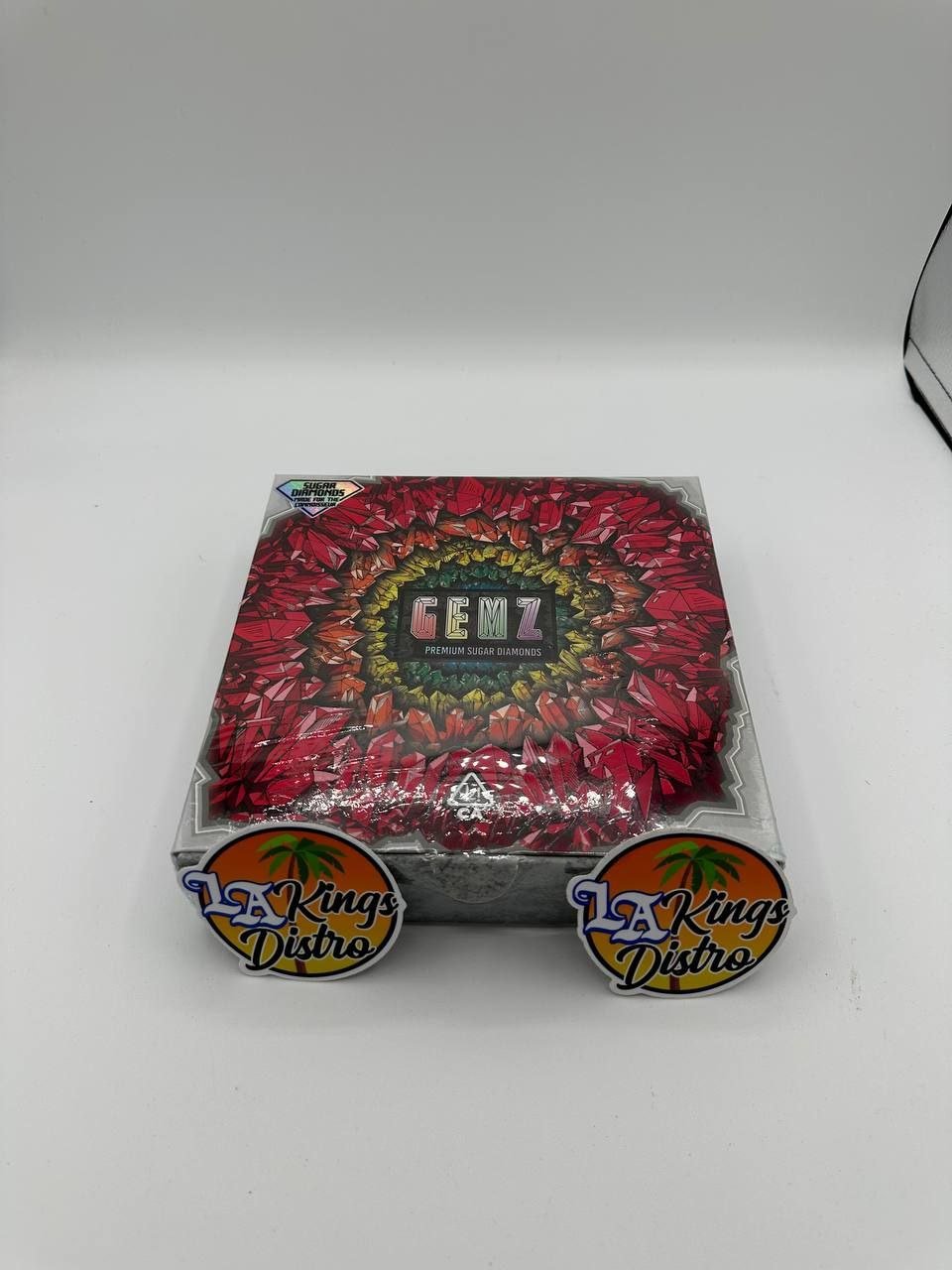 Gemz Premium Sugar Diamonds cannabis concentrate box with red gemstone design and GEMZ branding Gemz Premium Sugar Diamonds cannabis concentrate box with red gemstone design and GEMZ branding