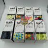 Authentic Turn 2G Botanica Blends disposable vape boxes featuring White Gummy Bear, Mango Guava OG, Gone Bananas, Gelato Paradiso, Berry Dreamy, Lemonade Stand and Kiwi Spiked Punch