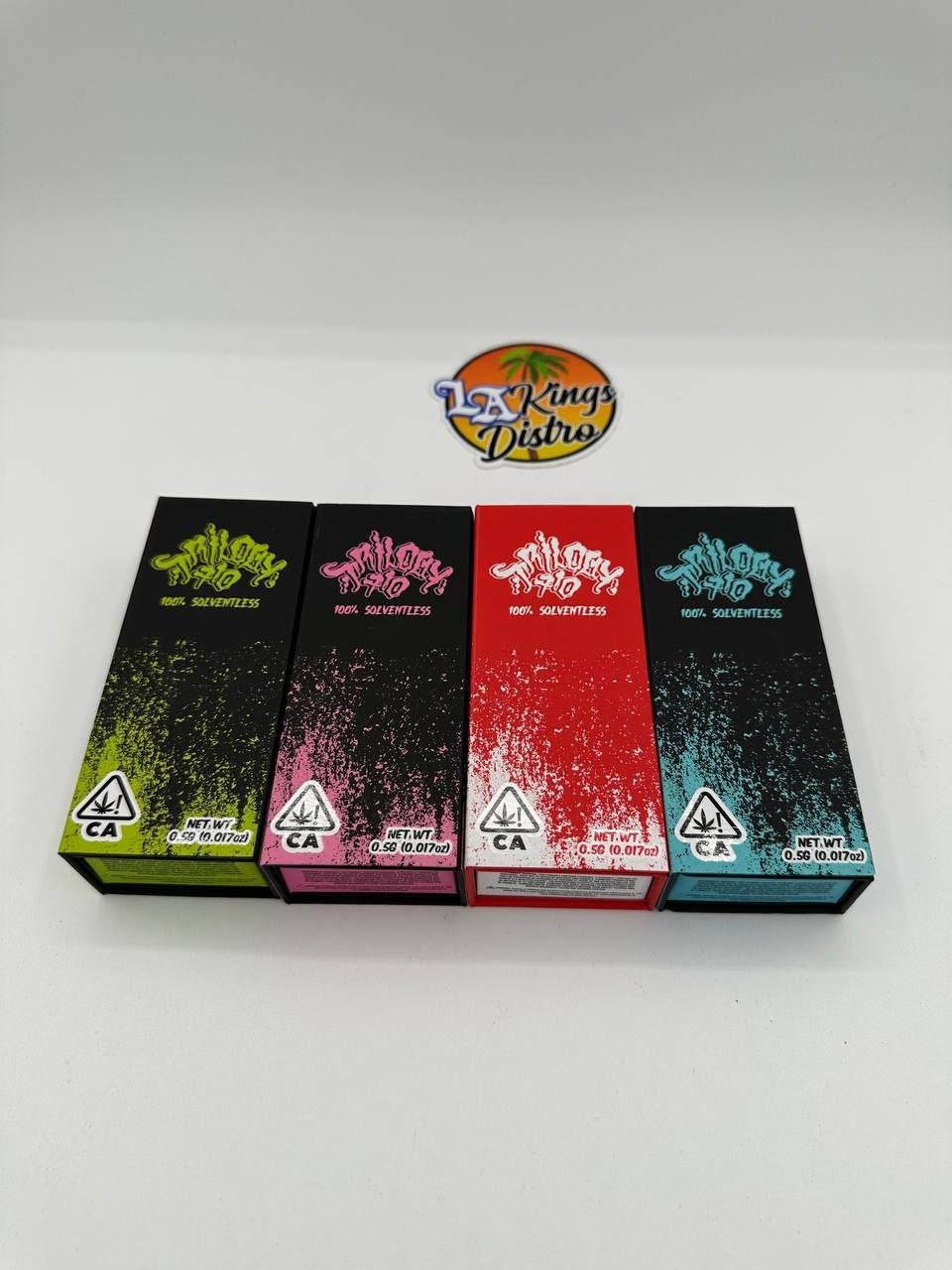 Trilogy 710 .5G hash rosin disposable boxes labeled 100% solventless in four package colors Trilogy 710 .5G hash rosin disposable boxes labeled 100% solventless in four package colors