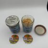 Cat 3 licensed lab-tested cannabis sugar concentrate displayed in glass jars with golden crystal texture
