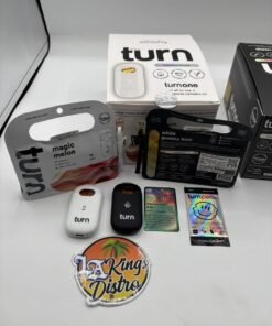 Turn One 2G disposable cannabis vape in black with Botanica Blends Magic Melon and White Gummy Bear packaging