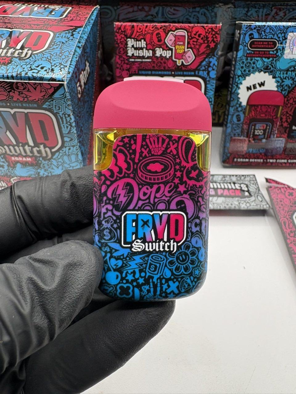 Authentic FRYD Switch 2G Liquid Diamonds and Live Resin dual-flavor disposable with digital display, colorful packaging and two included gummies. Authentic FRYD Switch 2G Liquid Diamonds and Live Resin dual-flavor disposable with digital display, colorful packaging and two included gummies.