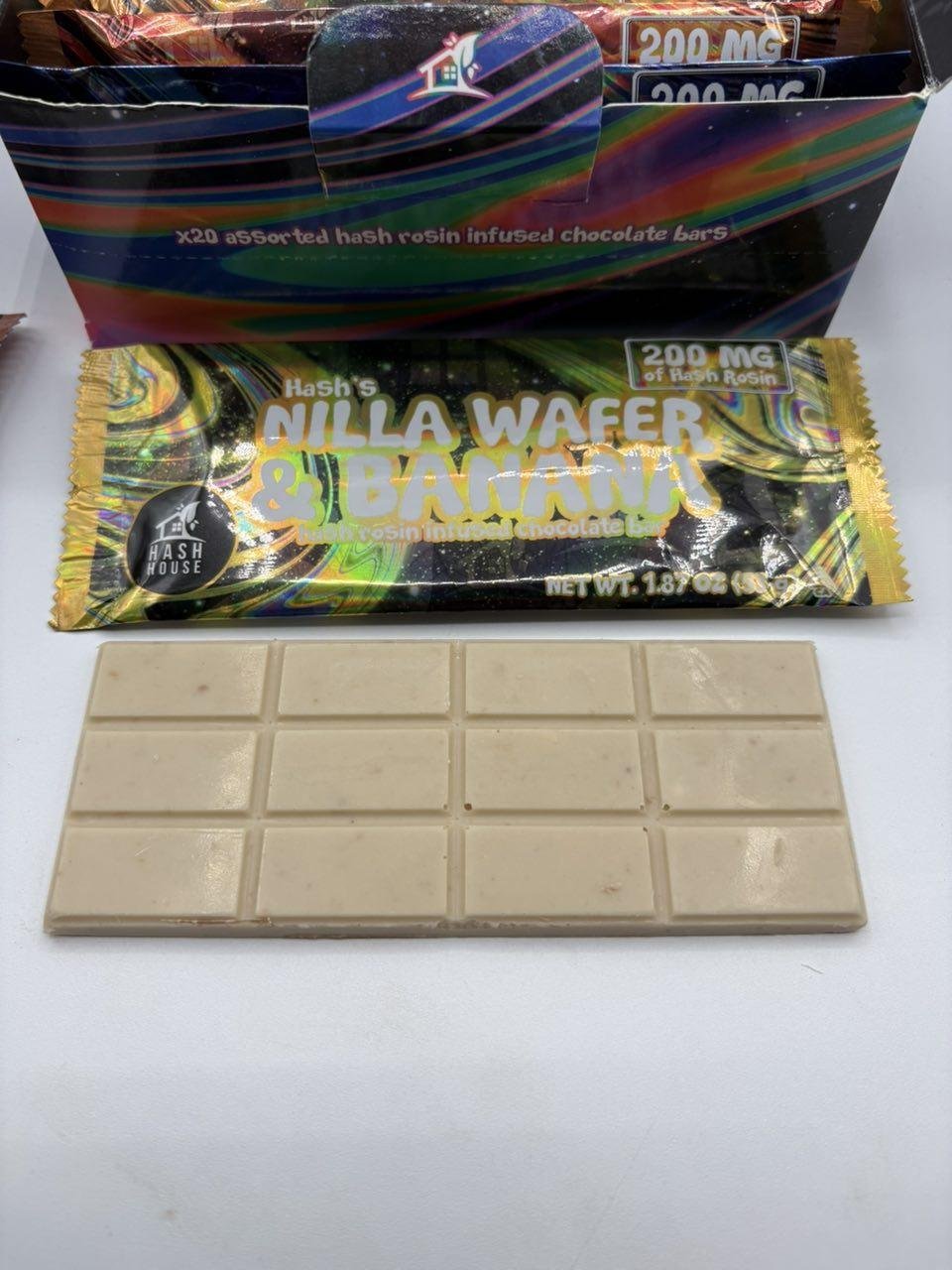 Closed Hash House 20-bar assorted chocolate display box with holographic branding and 200mg labeling Closed Hash House 20-bar assorted chocolate display box with holographic branding and 200mg labeling