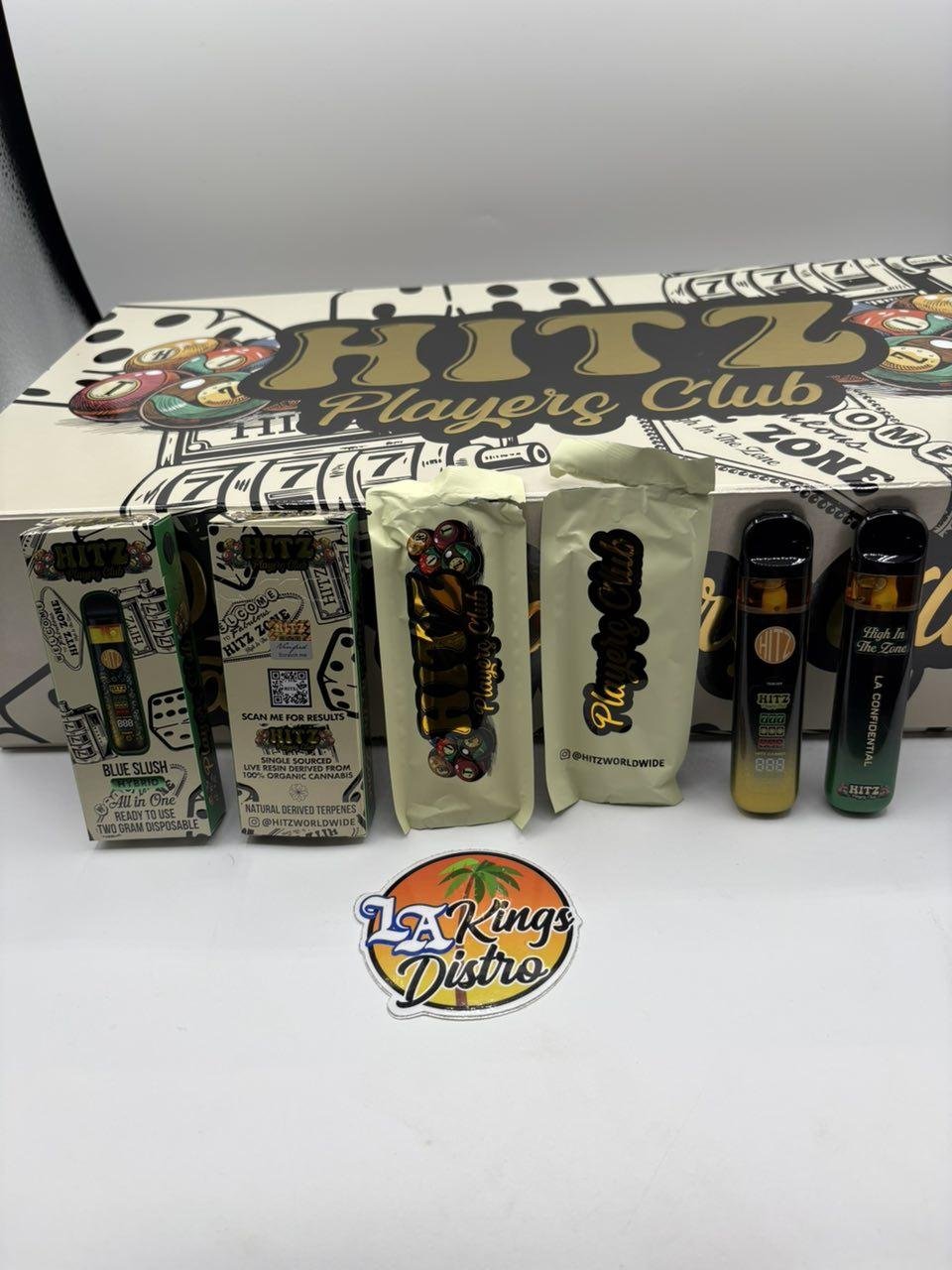 Open Hitz Players Club 100-stack case displaying ten flavors Open Hitz Players Club 100-stack case displaying ten flavors