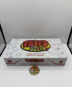 Authentic Faded Fruits 2G dual-flavor disposable vape with coral body and gold-toned mouthpiece