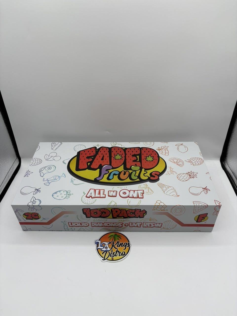 Authentic Faded Fruits 2G dual-flavor disposable vape with coral body and gold-toned mouthpiece Authentic Faded Fruits 2G dual-flavor disposable vape with coral body and gold-toned mouthpiece