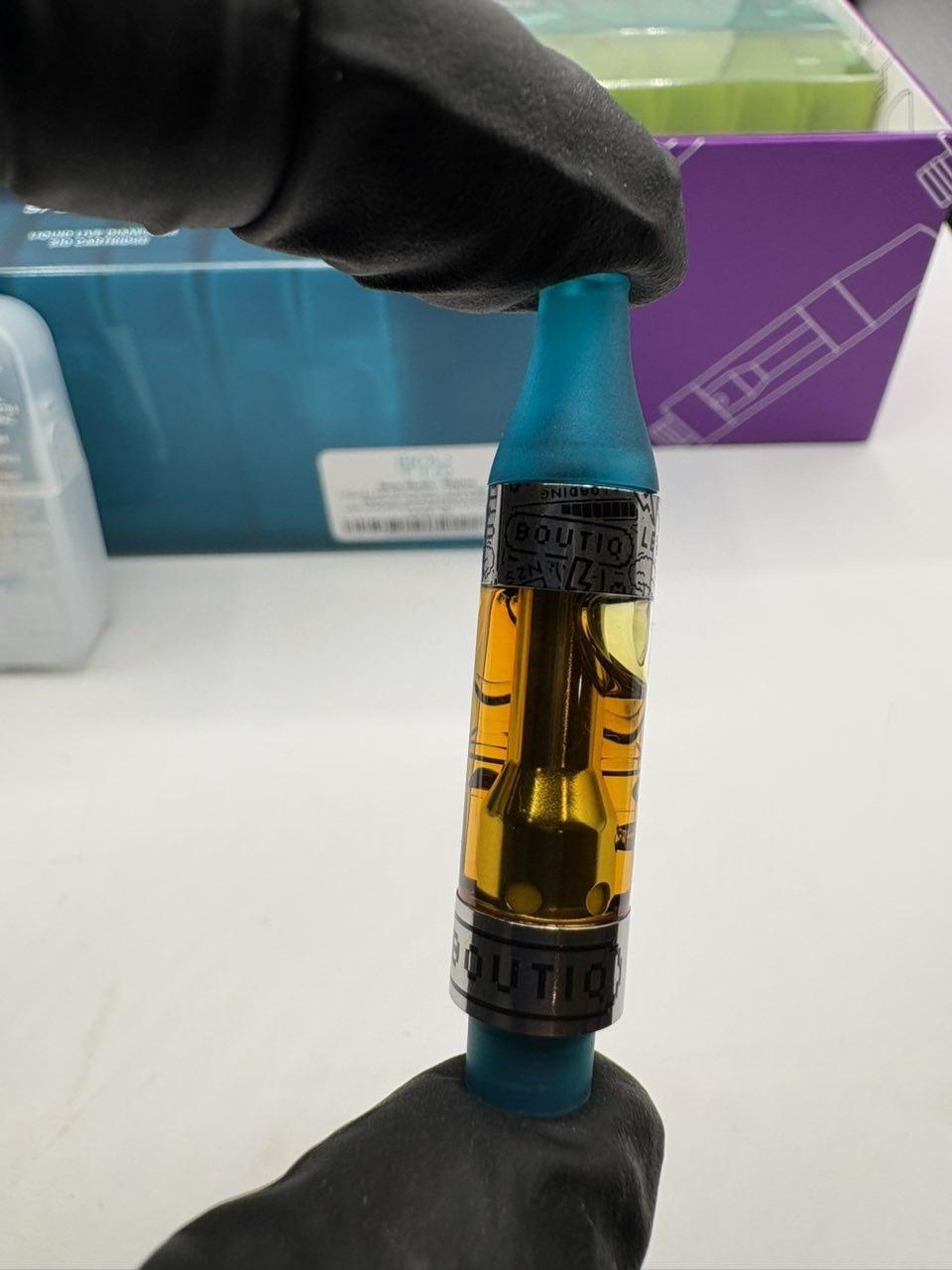 Closed purple Boutiq 510 Cart V1 100-count Liquid Live Diamonds wholesale case Closed purple Boutiq 510 Cart V1 100-count Liquid Live Diamonds wholesale case
