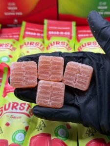 Authentic Bursts by Sauce 800MG Nano Live Resin Gummies display with assorted flavor packaging